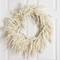 24in. Artificial Real Touch White Norfolk Island Pine Wreath with Natural Look